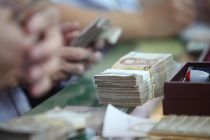 Central bank tightens grip on grey money